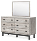 Vessalli King Panel Bed with Mirrored Dresser, Chest and Nightstand